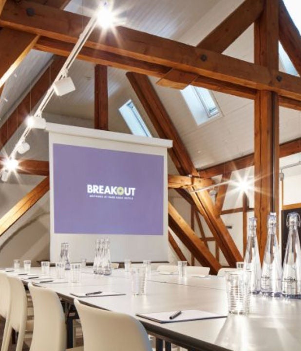 Conference room showing a presentation screen